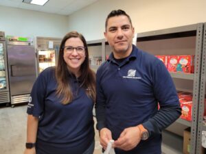 staff volunteers at food pantry